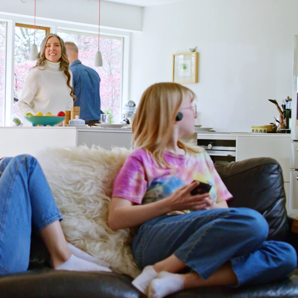 Listening music while being present during family moments.