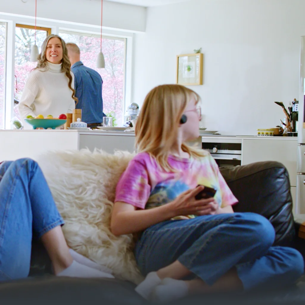 Listening music while being present during family moments.